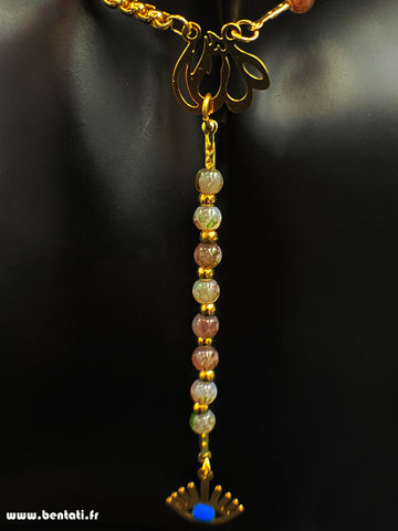 Necklace with pearls and devil's eye pendants