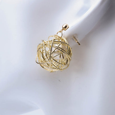 Golden geometric woven ball earrings with pearl for women's accessories by Bentati Fashion Dubai