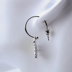 Golden flower pendant earrings for women's accessories by Bentati Fashion Dubai