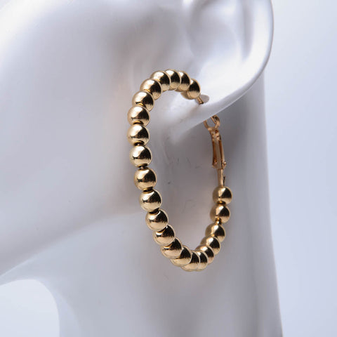 Golden round shaped beaded earrings for women's accessories by Bentati Fashion Dubai