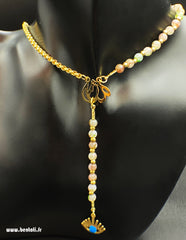 Necklace with pearls and devil's eye pendants