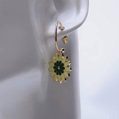 Golden flower pendant earrings for women's accessories by Bentati Fashion Dubai