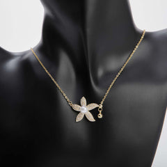 Golden flower pendant necklace with pearl for women's accessories by Bentati Fashion Dubai
