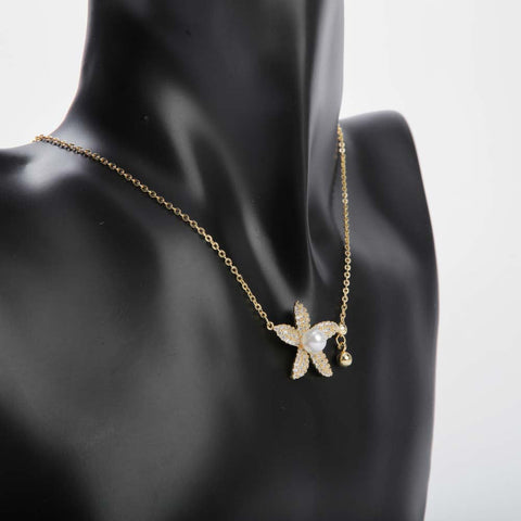 Golden flower pendant necklace with pearl for women's accessories by Bentati Fashion Dubai