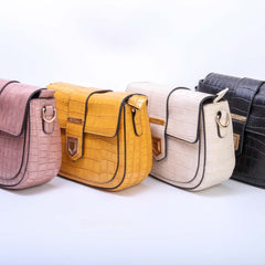 Black, pink, peach and khaki crossbody bags with detachable strap and tassel for women by Bentati Fashion Dubai