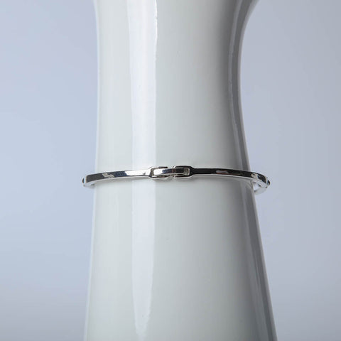 Silver two layer bangle with crystal arrow for women's accessories by Bentati Fashion Dubai
