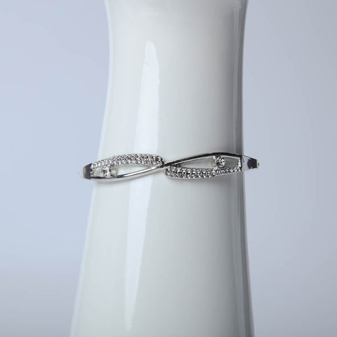 Silver infinity bangle with crystal stones for women's accessories by Bentati Fashion Dubai
