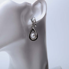Silver pearl hoop earrings for women's accessories by Bentati Fashion Dubai