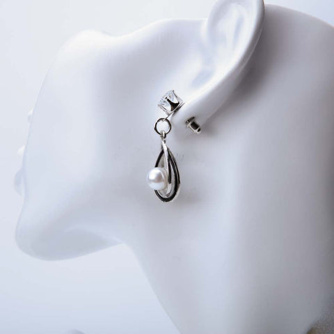 Silver pearl hoop earrings for women's accessories by Bentati Fashion Dubai